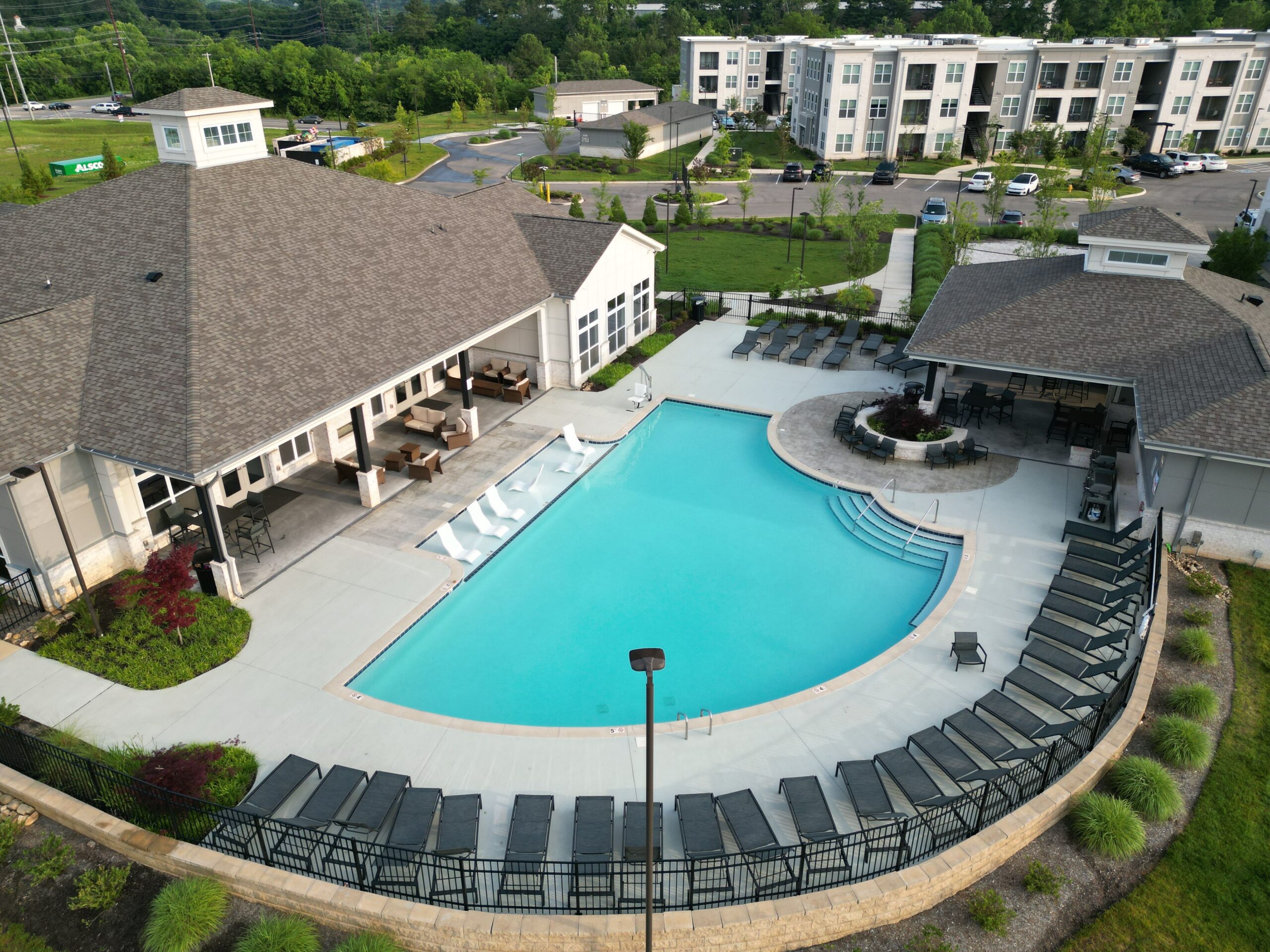 Aerial shot of a stylish apartment complex with a pool in Knoxville, TN.